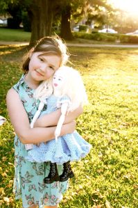 Beattie's older daughter Isobel, with a hand-made friend! 